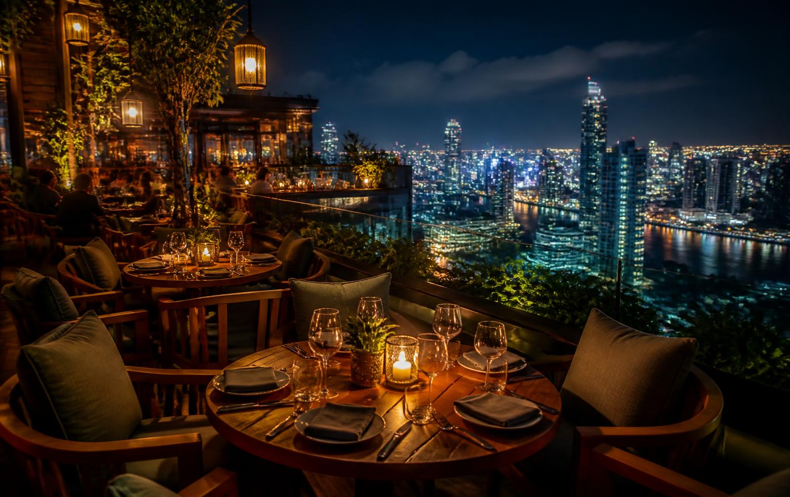 Rooftop restaurant in Bangkok with city lights below